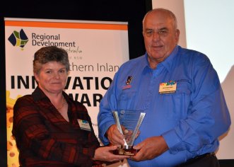 Pam Welsh from Trade and Investment, NSW presented the 'Tourism / Leisure and Related Services Category' award to Les Parsons on behalf of 'The New England North West Regional Tourism Drive Campaign'.