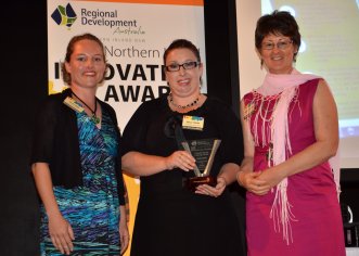 Kate James from New England Mutual presented the 'Professional and Retail Services Category' award to Kelly Foran and Bronwyn Clarke of the “Friendly Faces Helping Hands” information service operated from a farm 60km east of Boggabri.
