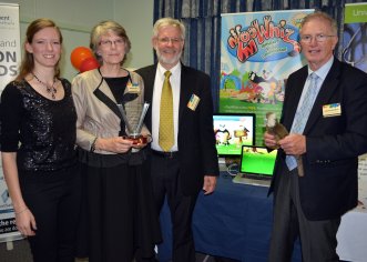 AgriFood Skills Australia CEO, Arthur Blewitt (right) with winners of the 'Research and Education Category' Laura, Barbara and Graham East from Armidale educational software business EdAlive for its online development, 'ZooWhiz'.
