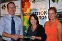 The Telstra Business Centre's Chris Ash, with Judy and Savannah Peterson from Tourism/Leisure winner, Petersons Armidale Guesthouse and Winery.