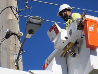 Essential Energy contractors installing the new LED street lights
