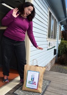 RDA Northern Inland Come On Shopping Project and Communications Officer Tiff Gilleland getting a delivery.