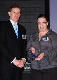 AusIndustry’s Regional Manager for Northern and Central NSW, Tim Cotter presented Kelly Foran with an Encouragement Award in the Professional and Retail Services Category for her ‘Friendly Faces, Helping Hands’ website.