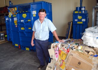 2010 Manufacturing and Engineering winner, Reg Trethewey. The holder of over 120 patents is pictured here with one of the Trethewey Industries innovations. Manufactured in Deepwater, the cardboard Autobaler can be found in supermarket loading docks around the country.