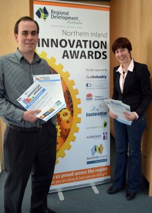 RDA Northern Inland Executive Officer, Nathan Axelsson and Senior Project Officer, Kim-Trieste Hastings with a promotional banner for the Northern Inland Innovation Awards. 