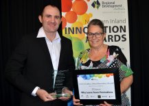 Ashley Watt from Retail, Tourism and Leisure category winner Why Leave Town Promotions of Narrabri, with Telstra Store Inverell's Wendy Wilks
