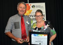 Graham Moore from Retail, Tourism and Leisure finalist, Moore Venison, presented by Telstra Store Inverell's Wendy Wilks