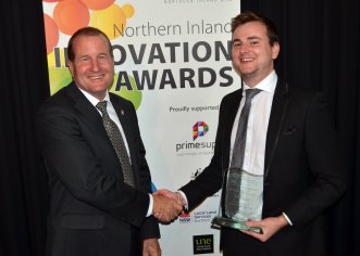 Professor David Lamb from UNE, presented the “Professional and Government Services” winner's trophy to Whitehack's Adrian Wood