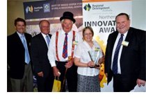 Member for Tamworth, Kevin Anderson; Member for New England, Tony Windsor; Howard and Pam Eastwood from 2011 Innovation of the Year winner, Glen Innes based 'Photo Create'; and Chair of Regional Development Australia Northern Inland, Mal Peters. 