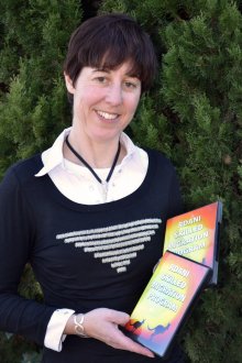 RDANI Snr Project Officer, Kim-Trieste Hastings, with the DVD promoting Northern Inland NSW, which she took to the UK. 